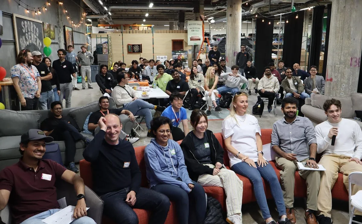 An engaged audience taking part in a professional founder gathering
